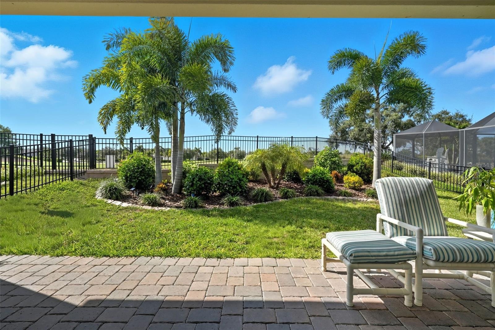 Covered patio vibes—watch the 16th hole action and soak in those stunning sunsets!