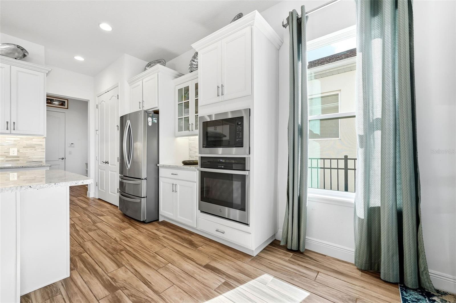 Convenient access to the garage makes carrying in groceries a breeze—everything you need for effortless cooking!