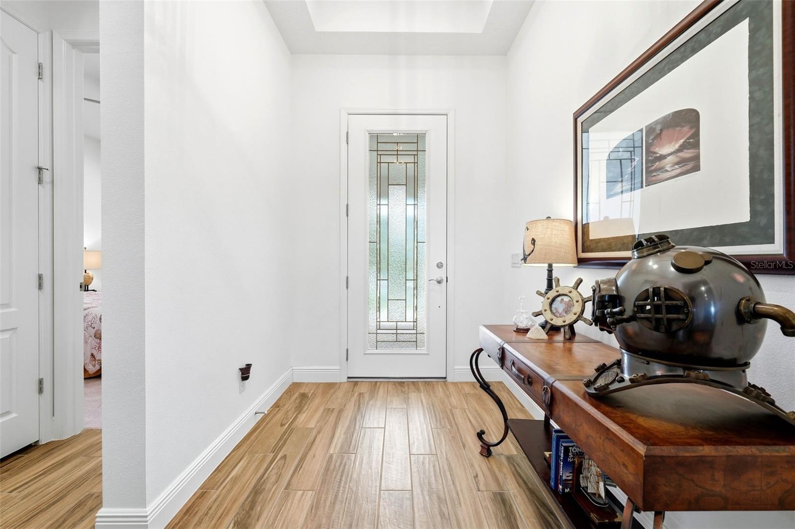 Step into a spacious entry with a beautiful tray ceiling—welcoming from the moment you arrive!