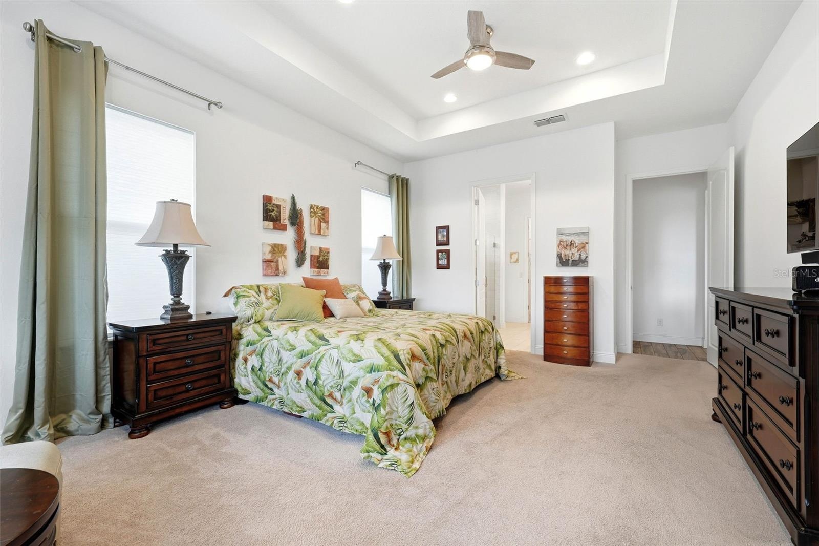 Your private retreat features an entryway to the primary suite, designed for comfort and relaxation.