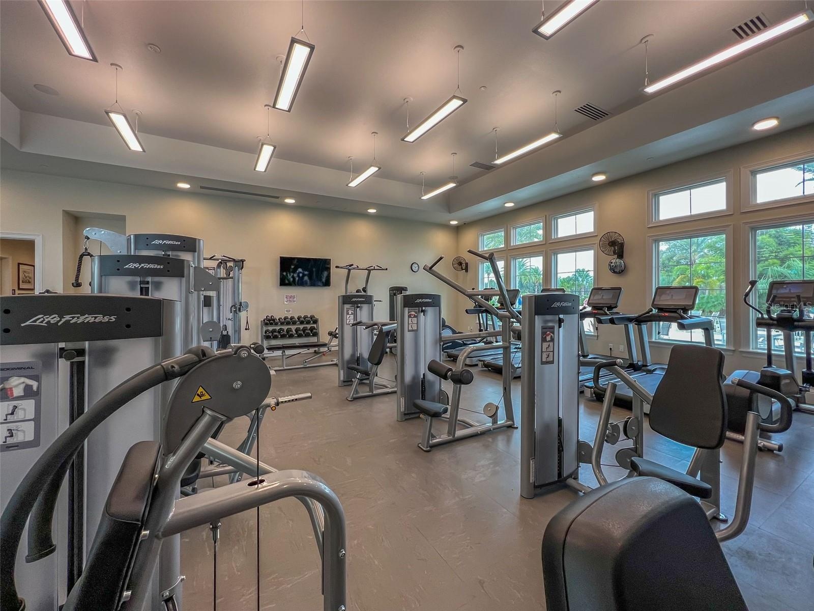 Exercise room ready for your workouts—sweat, stretch, and stay strong!