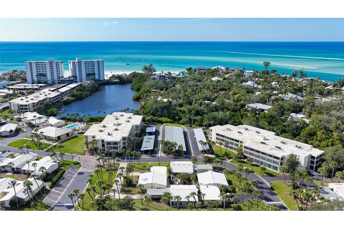 This wonderful villa is nestled in the quad of 4 in this aerial photo in the Gulf front property of Whispering Sands!