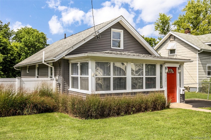 Front of home with perennial grasses.