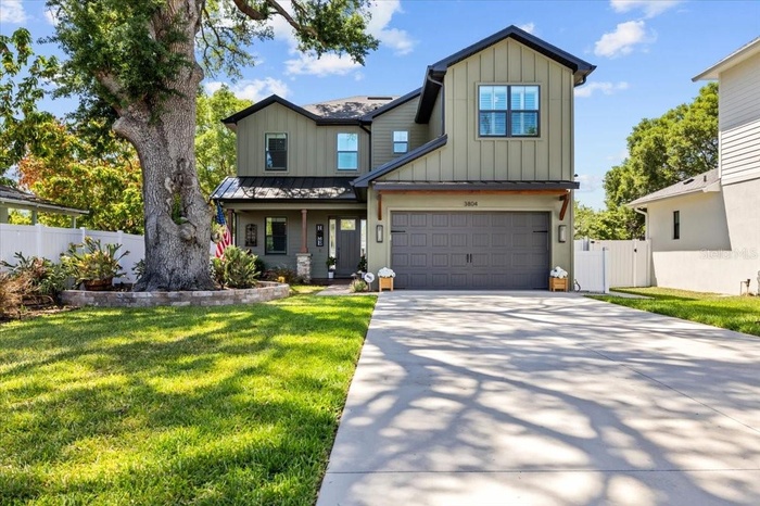 Front view w/large driveway