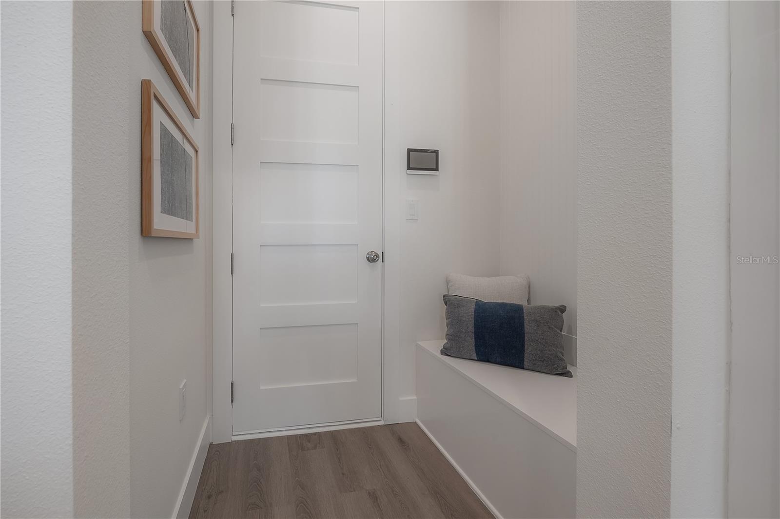 Entry vestibule just off the spacious one-car garage