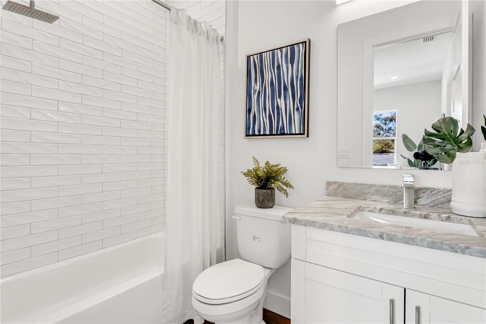 Photo from decorated model home, Bath 2