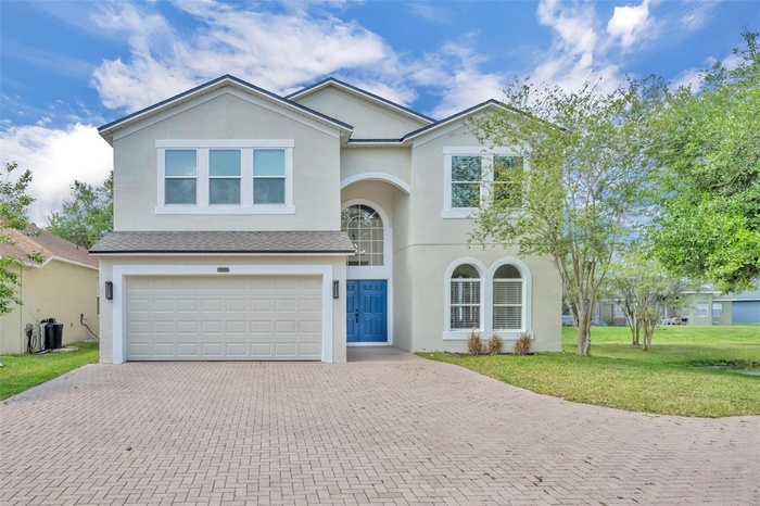 Front of Home w/ Pond to Right Side