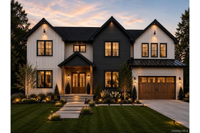 Modern farmhouse-style exterior featuring vertical board siding and dark horizontal siding accents