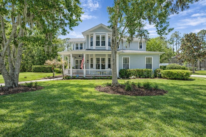 A rare opportunity to own space, privacy, and timeless design—tucked behind the gates of Fish Hawk Trails.