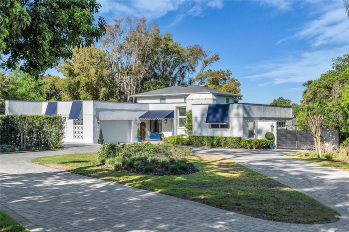 Beautifully renovated LAKE FAIRVIEW lakefront home on over 1 acre lot with private boat dock