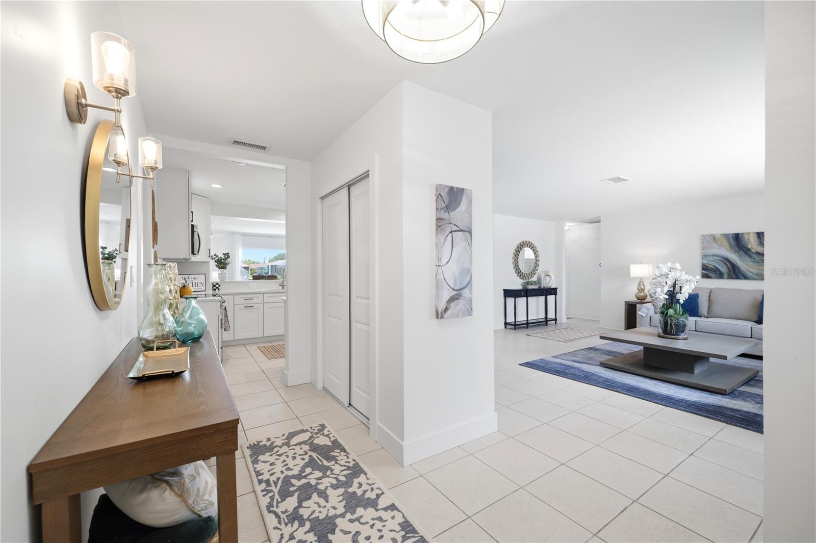 front hall foyer with views of the formal living room