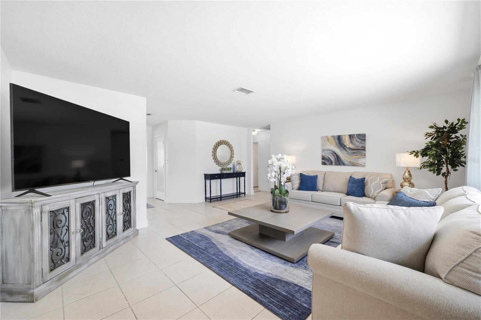 open concept formal living space as you walk in