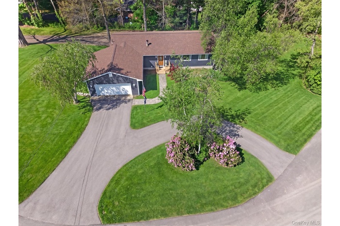 Welcome Home! Ariel View of the Home - Retouched driveway.