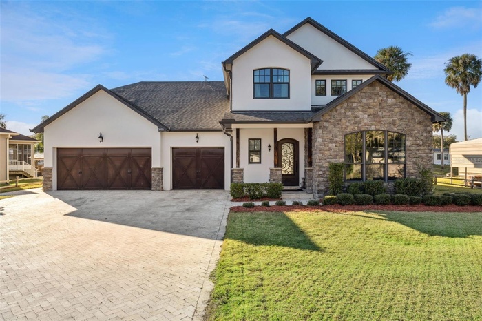 In the perfect location, on an oversized lot, set on a private DEEP-WATER CANAL in the sought-after Palm Shadows community, this exceptional CUSTOM BU