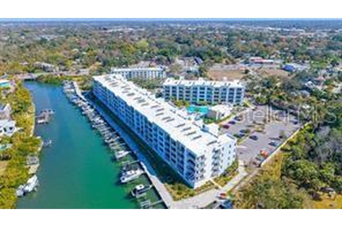 Welcome to THE STRAND, a waterfront community just minutes from downtown Sarasota