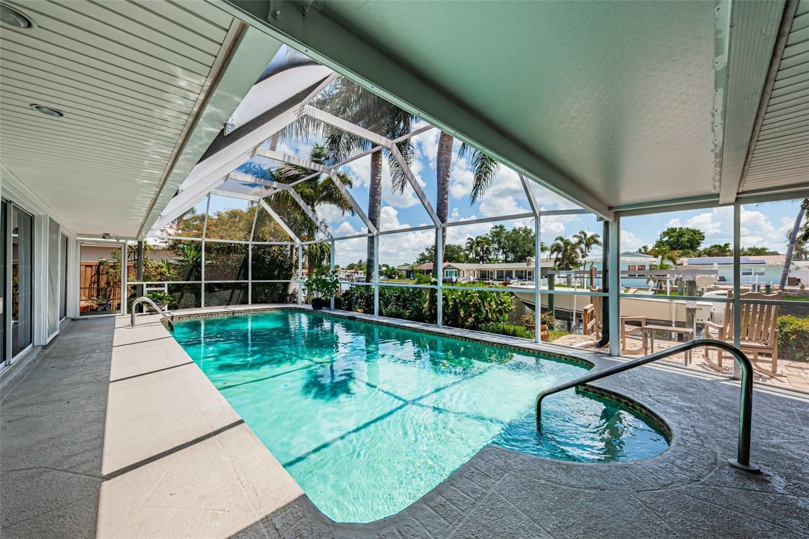 Most living spaces overlook the pool