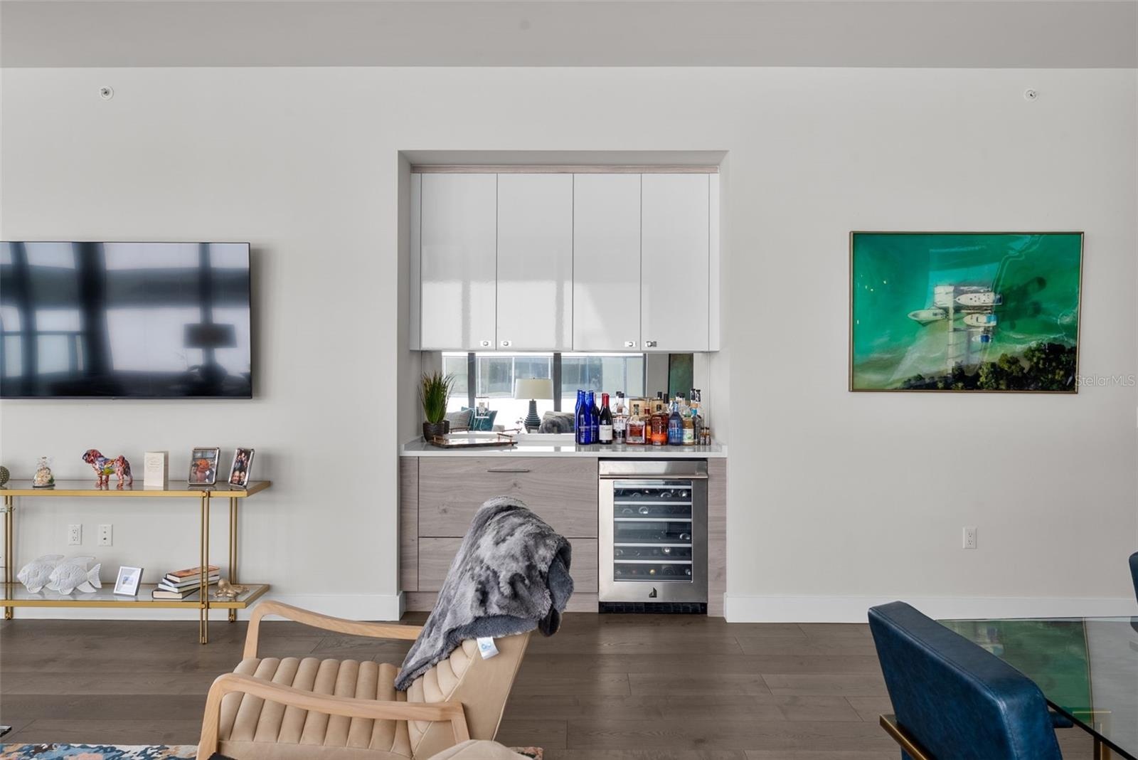 Wet bar/beverage cooler in family room.