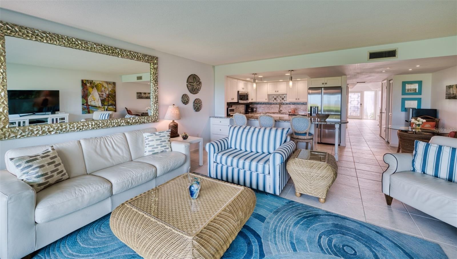Turnkey furnished.  Come in, kick off your shoes, put your toes in the sand and forget everything else!