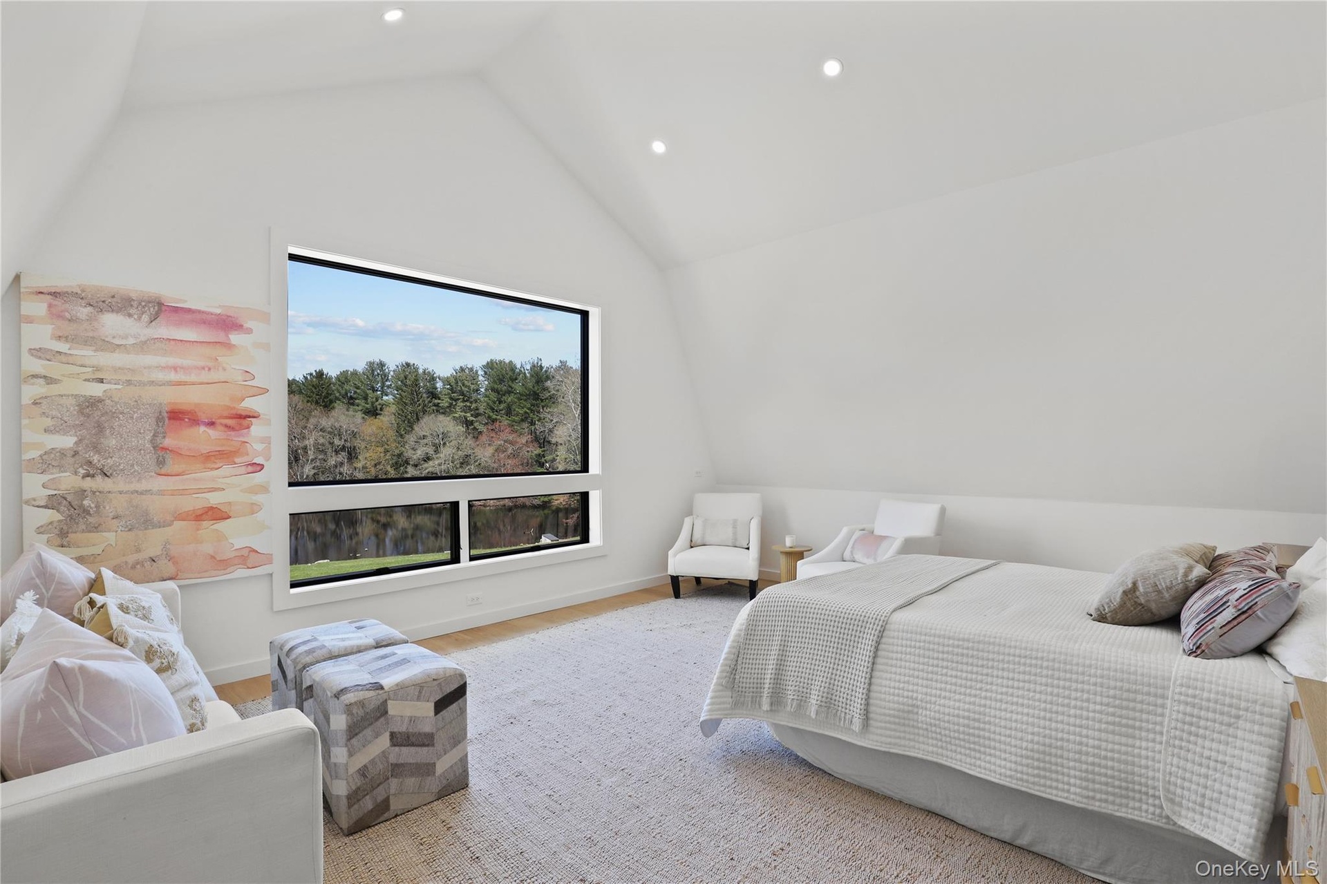 Guest studio suite with full bath above one of the two detached garages