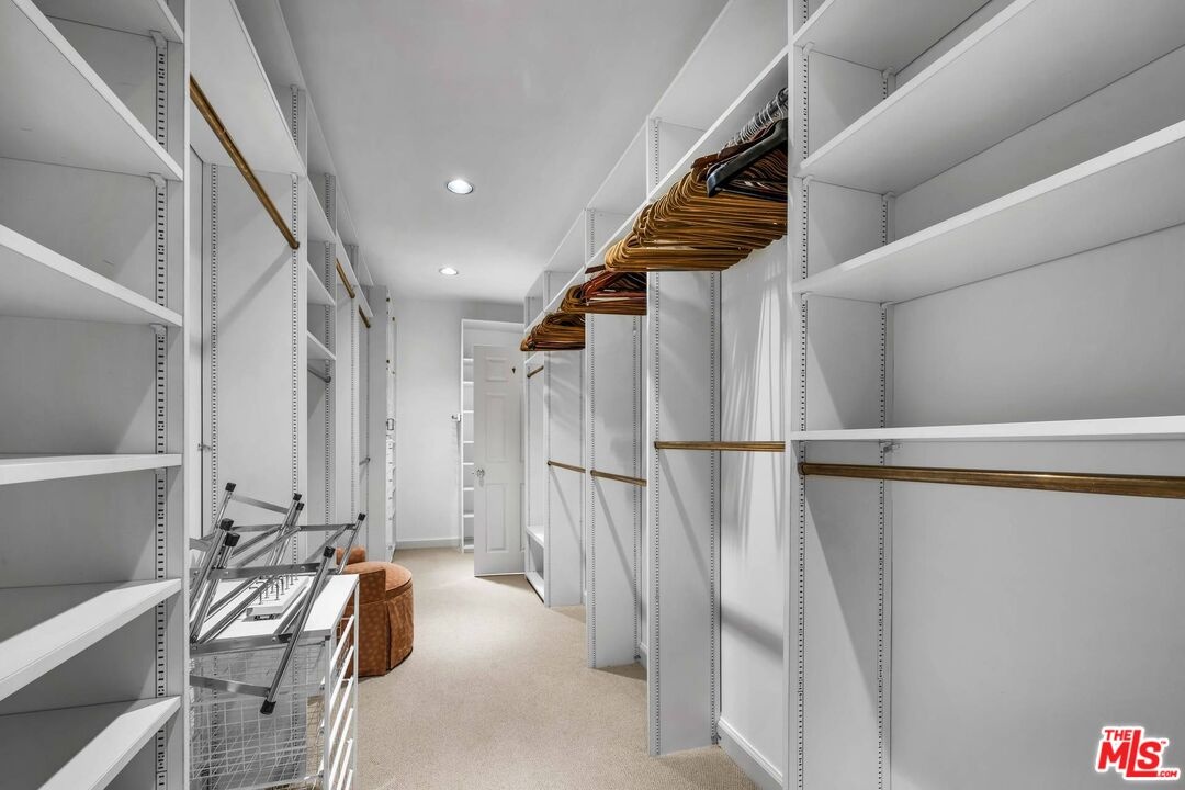 Walk-in closet with custom bui