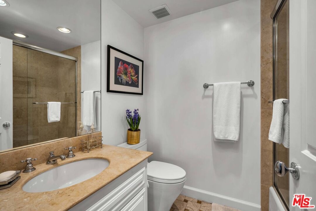 Bathroom with stone countertop