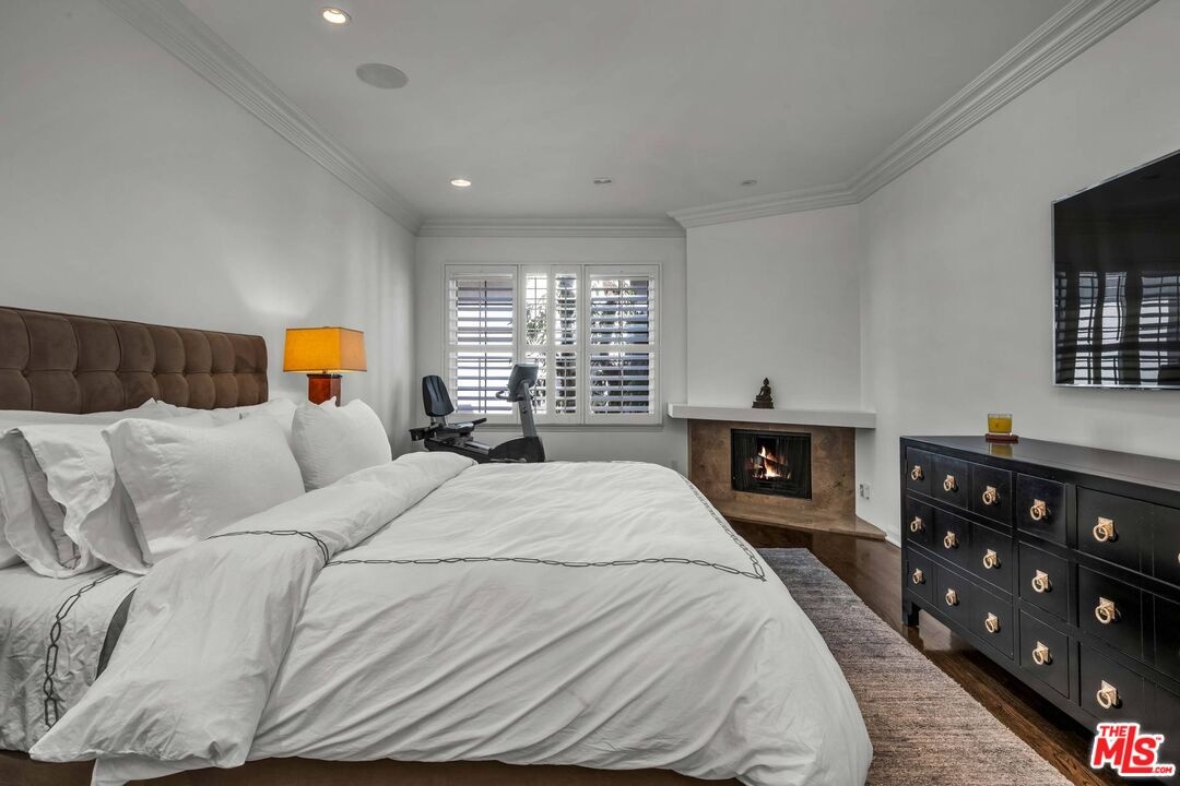 Primary bedroom with hardwood