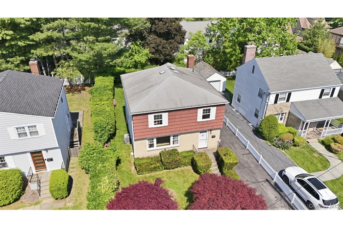 Ideally situated in the coveted Edgewood section of Scarsdale