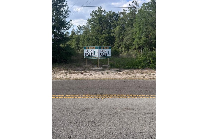 Sign facing Kelly Park Rd