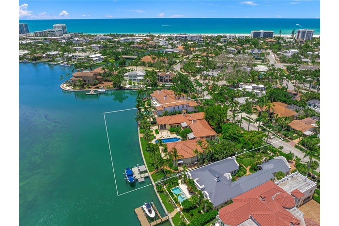 AERIAL BACK OF HOME AND LIDO BEACH-3 LOTS AND 171 FT WATER FRONTAGE