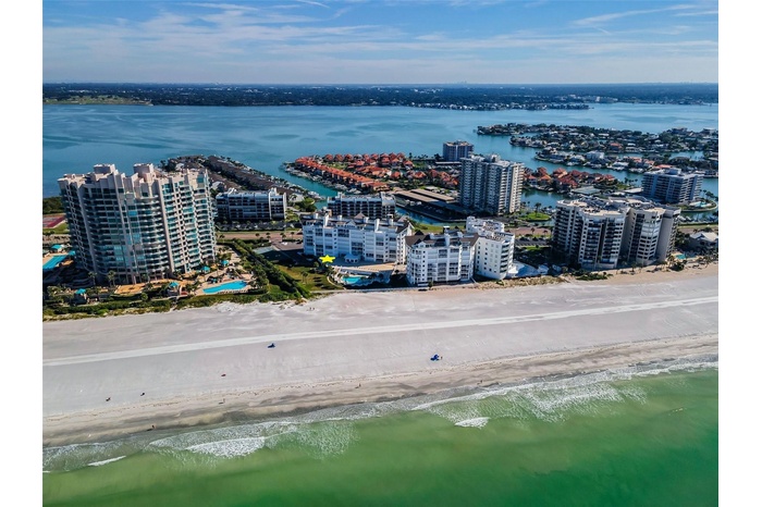 ... Boat Parades- Sailing Regattas - Sand Key Florida - The Beach on One Side and the Intracoastal Waterway on The Other Side. The Cabana Club Enjoys 