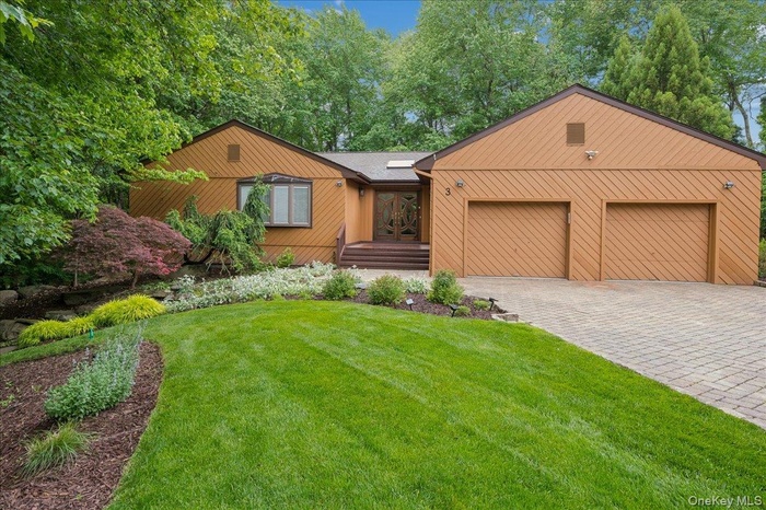 Live in highly sought-after TARRY HILL and experience luxury at its finest in this stunning 4-bedroom, 3-bathroom contemporary ranch, nestled on a .67