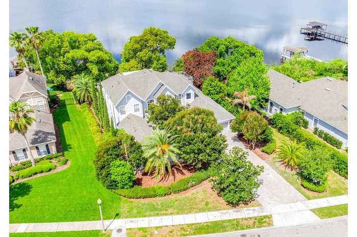 NEW ROOF (2025) ~ TWO NEW A/C UNITS (2024) ~ and a NEW WATER HEATER (2024) headline this exceptional LAKEFRONT ESTATE on Black Lake, where recent RENO