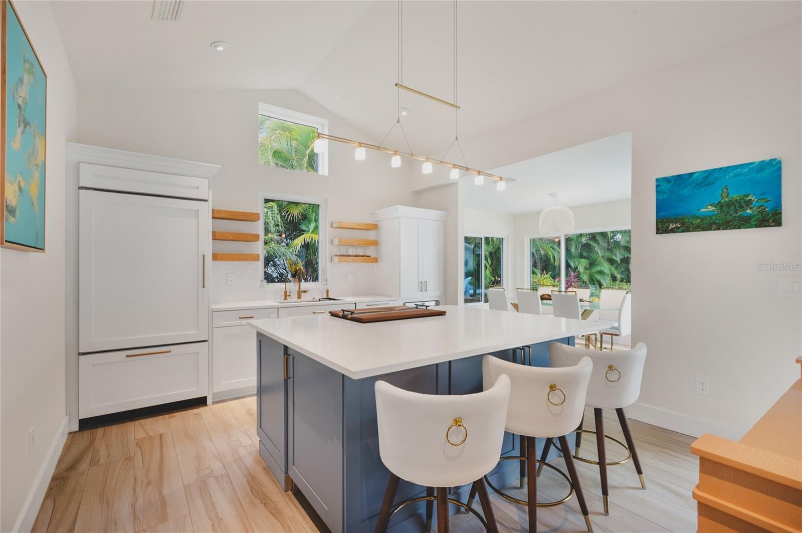 Beautiful new kitchen with quartz counters, Sub-Zero refrigerator, Wolf Range and microwave and Bosch Dishwasher.