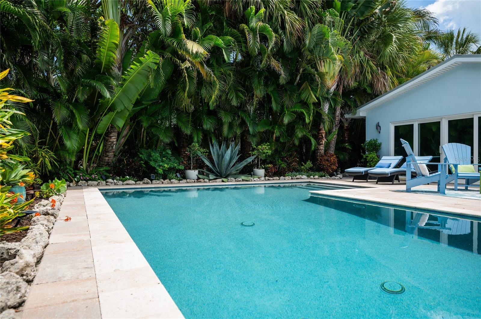 Mature tropical landscape surrounds the property