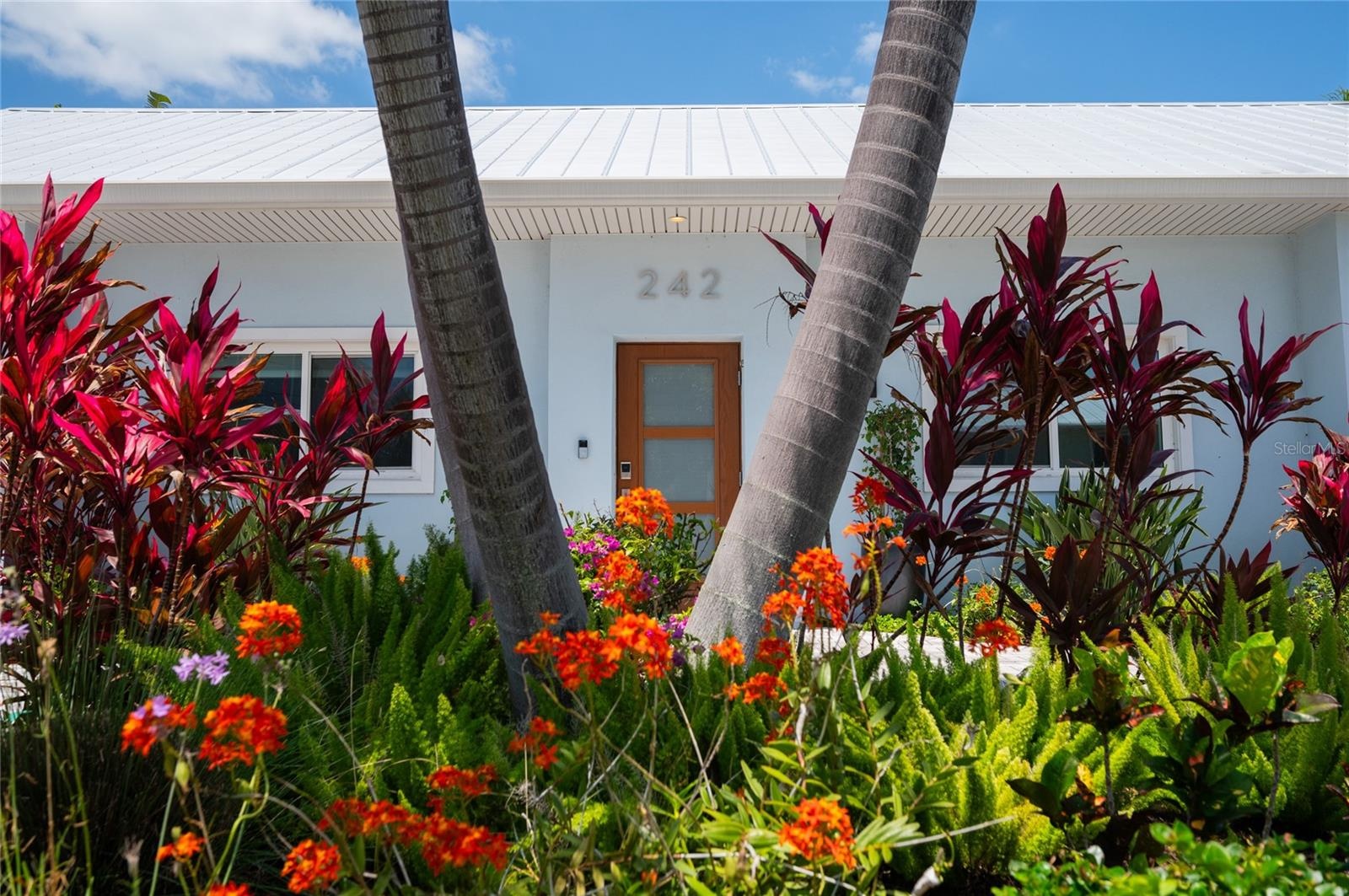 Tropical landscaping with lots of color all around