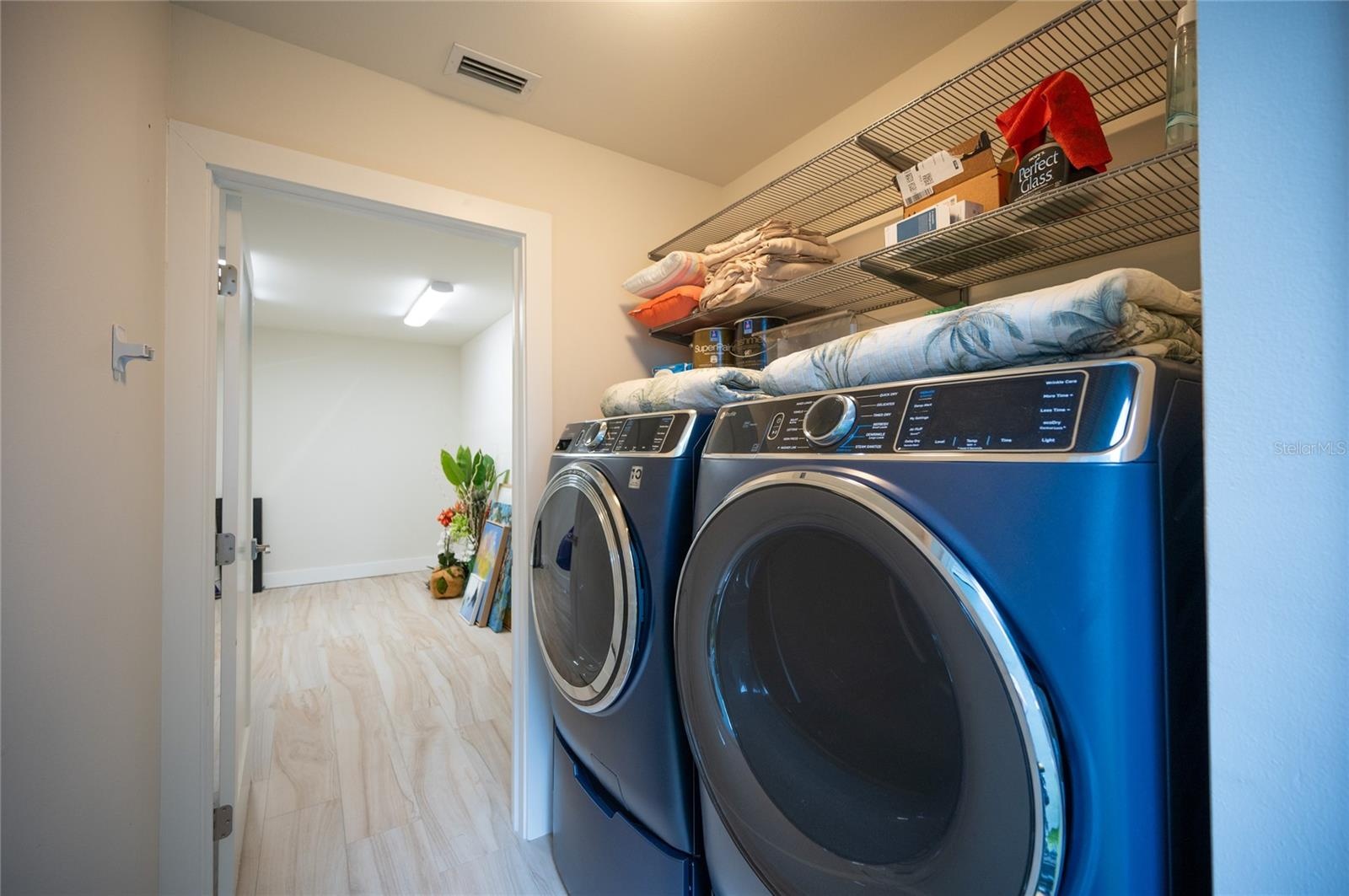 The laundry room is located in the Casita and also features a large storage room.  Both rooms are air conditioned.  The storage room would also be a g
