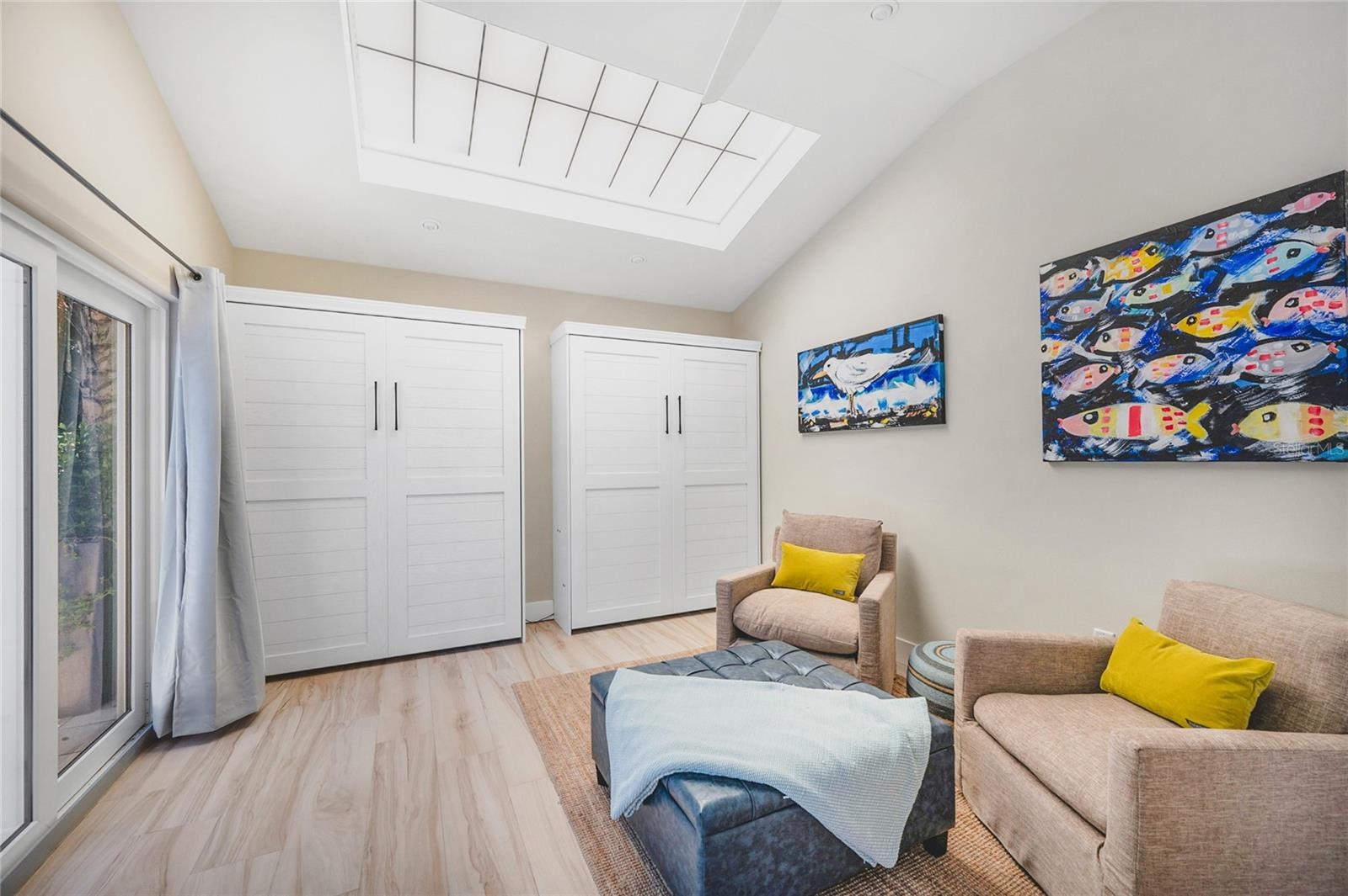 As you enter from the main studio are of the Casita you will find vaulted ceilings, 2 Queen size Murphy beds, a comfy sitting area, original artwork b