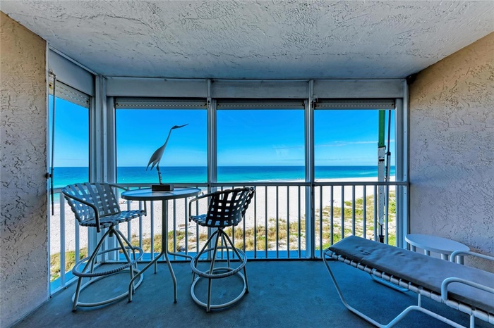 Screened balcony - providing outdoor space and Gulf Breezes