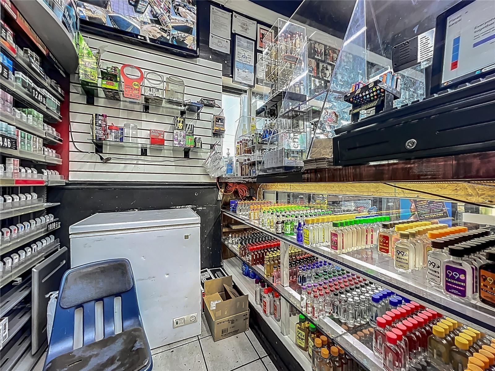 Main Glass-Enclosed Register with Front Counter Liquor Display