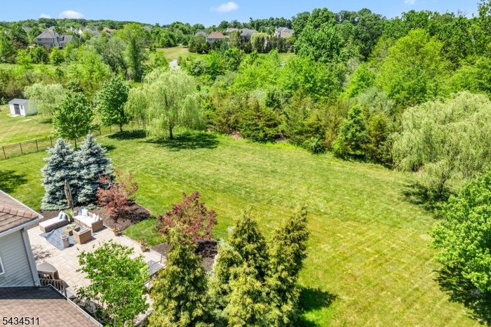 BACKS TO TOWNSHIP OWNED WOODS