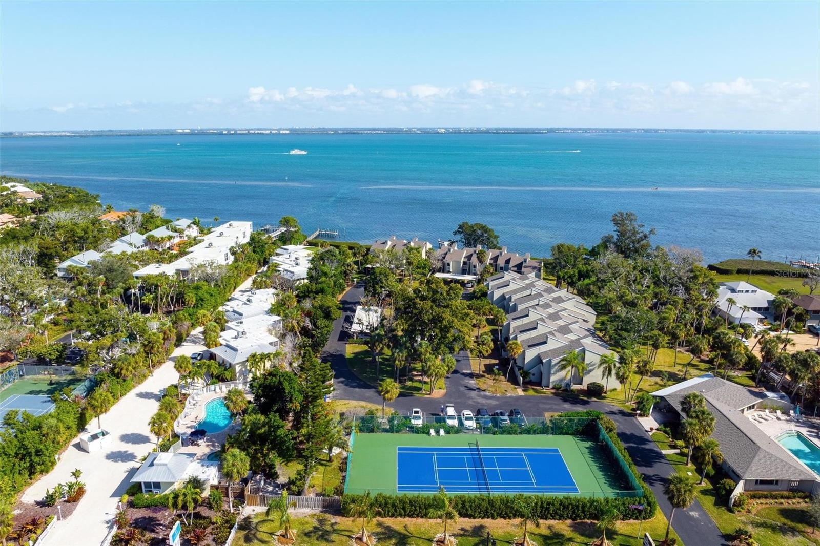TENNIS OR PICKLEBALL; CLUBHOUSE WITH POOL