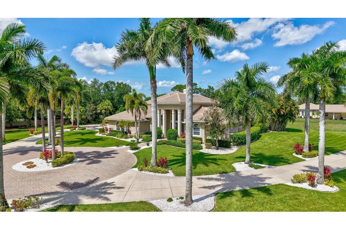Privately situated on 5.1 acres, this custom-built estate offers 4 bedrooms, 4 full baths, 2 half baths, 6,721 square feet of living space.