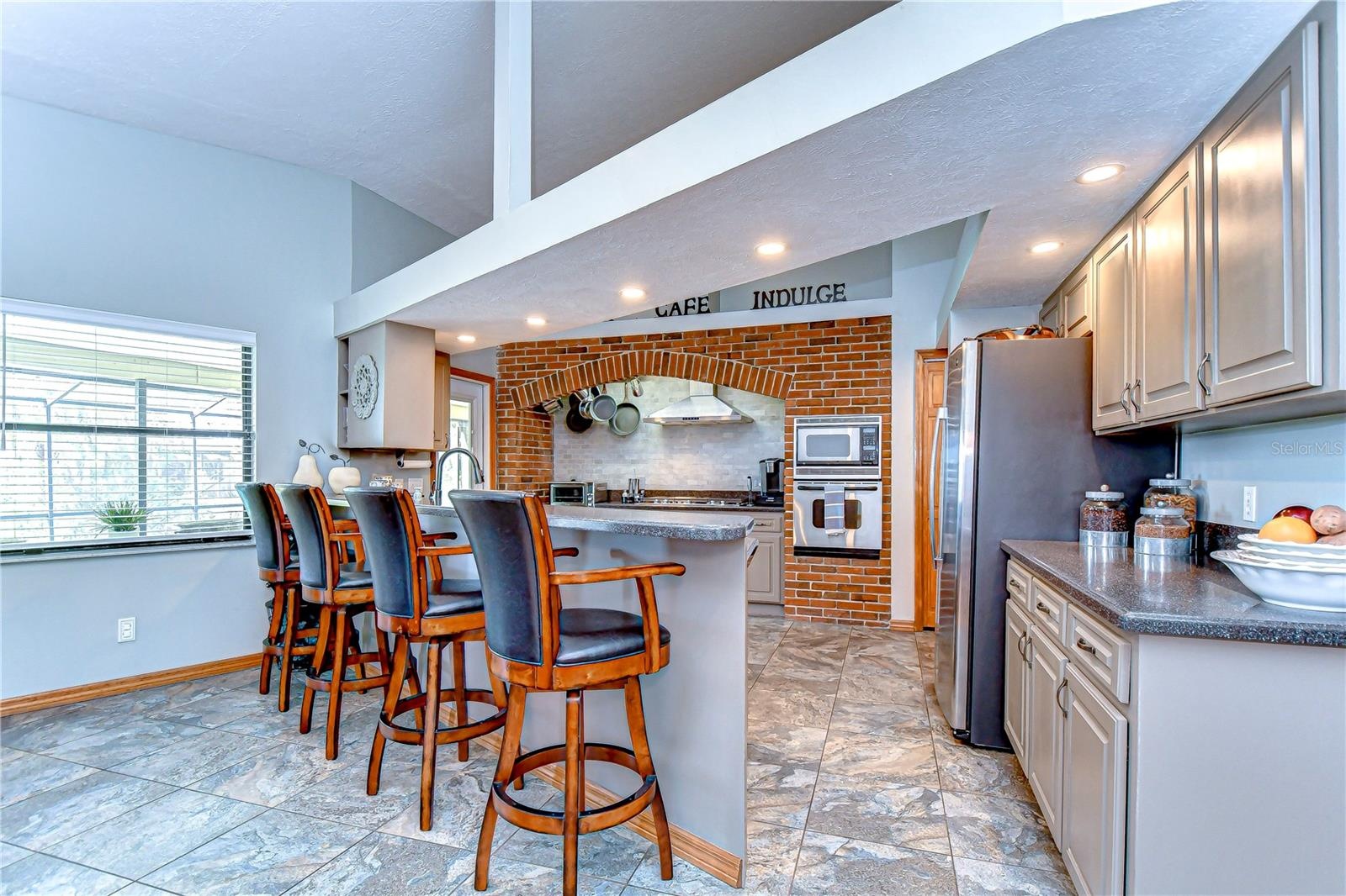 Kitchen with Bar Seating & Entertaining Space