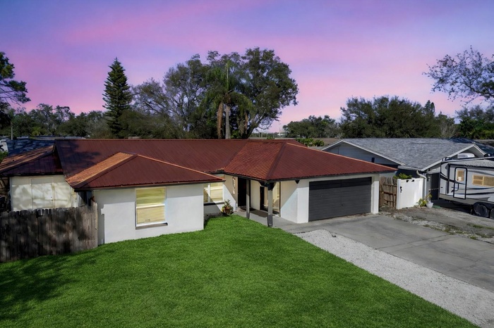 Welcome home to this spacious Seminole home on a corner lot!