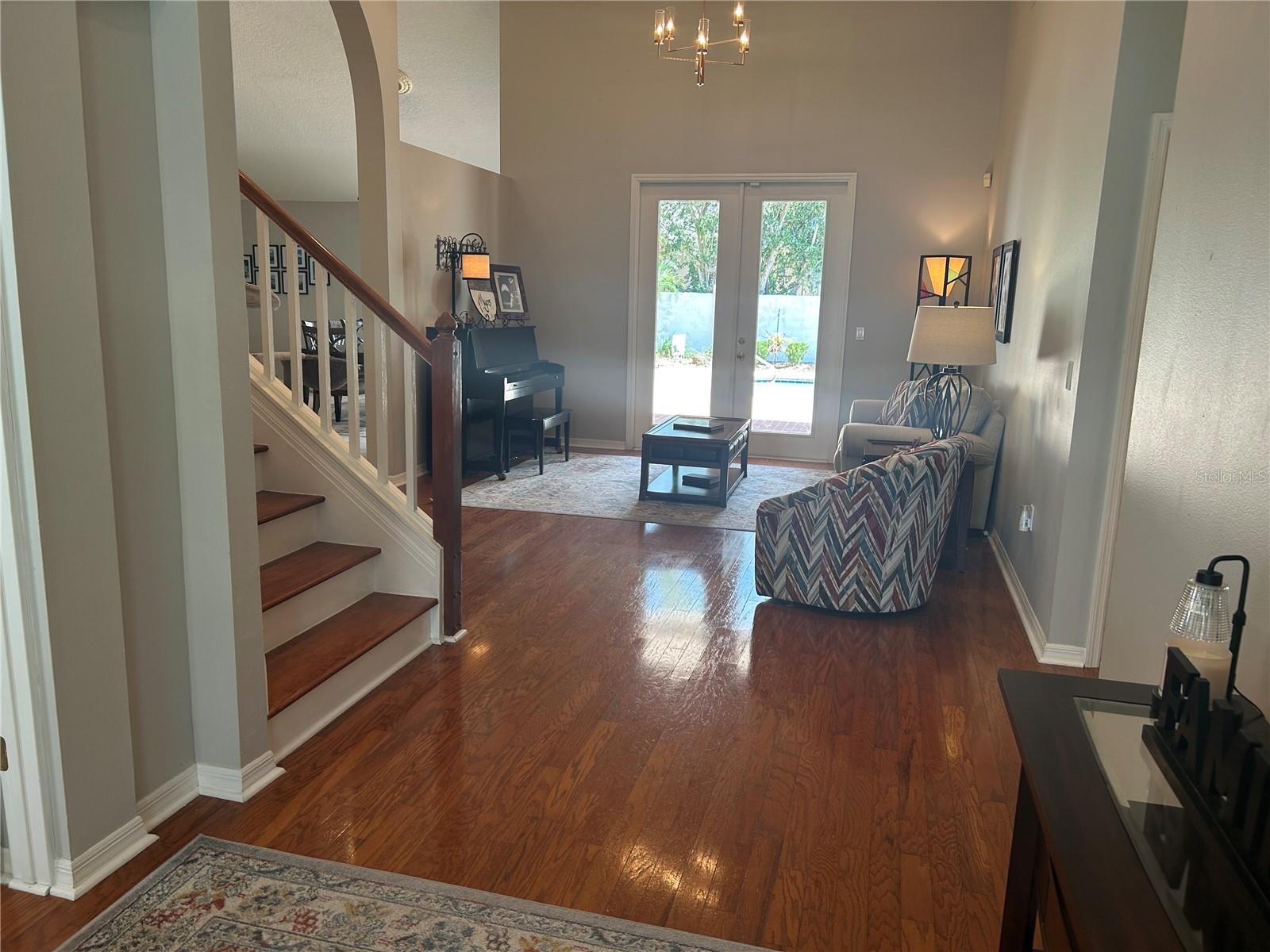 Entrance- living room looking out to the pool area