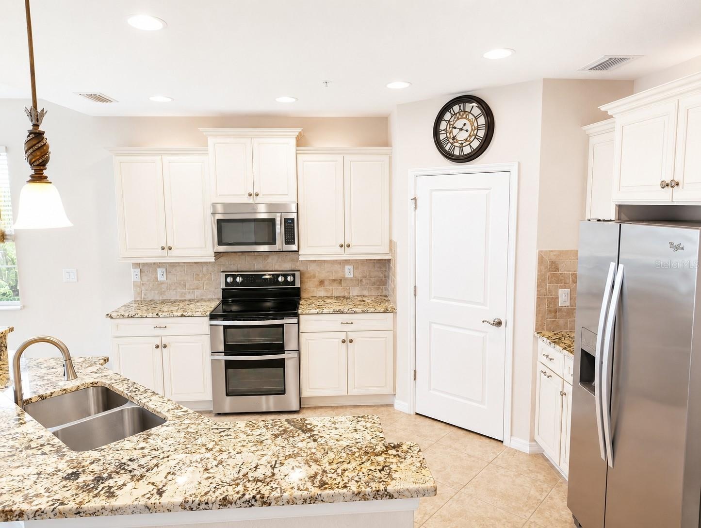 Kitchen with new double oven.