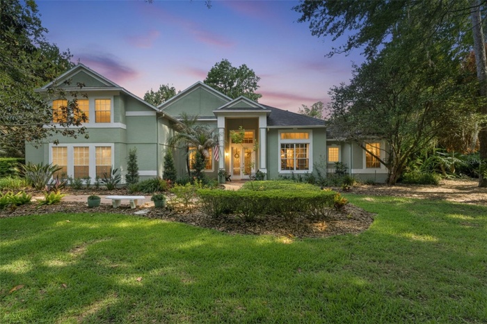 Custom Von Jacobs-built estate home in gated Reserve at Tuscawilla