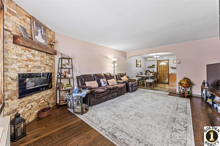 Gorgeous Living room with Custom Designed Fireplace - Open Spacious Sun Drenched