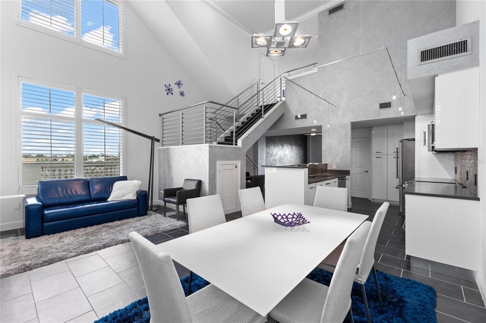 Soaring ceilings with ample windows that create an expansive, light-filled interior.