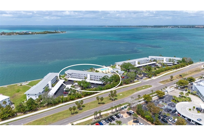 First floor unit overlooking pool and Sarasota Bay.